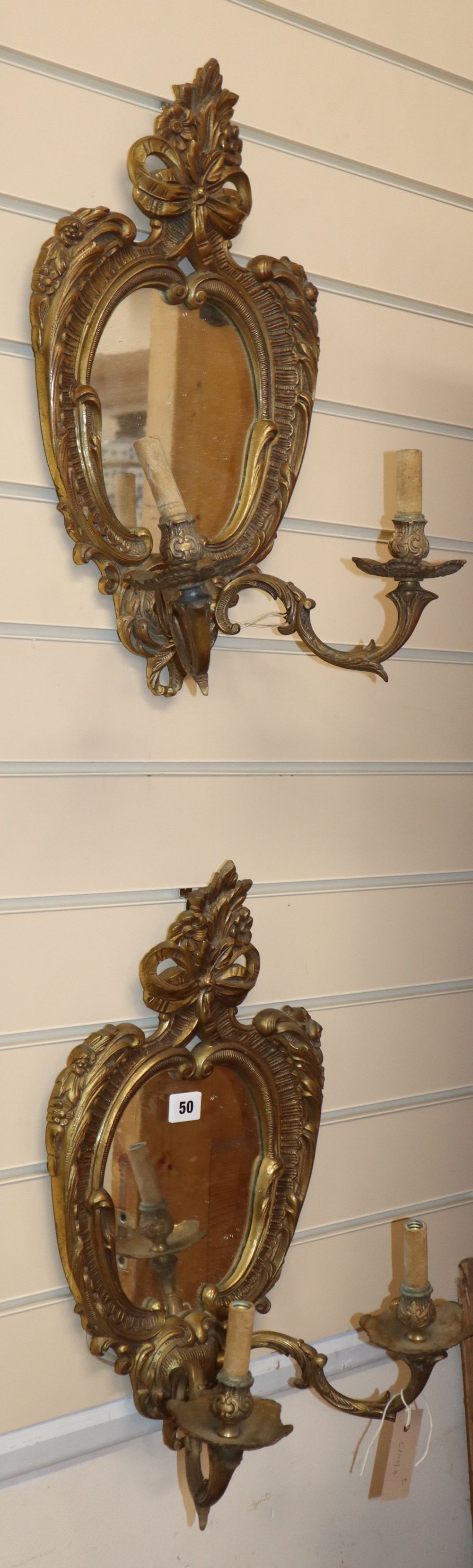 A pair of cast brass girandole mirrors, H.48cm